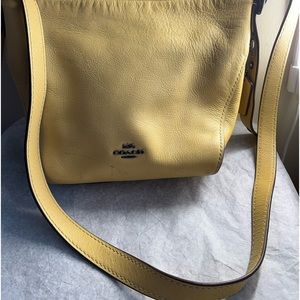 Coach women yellow handbag.